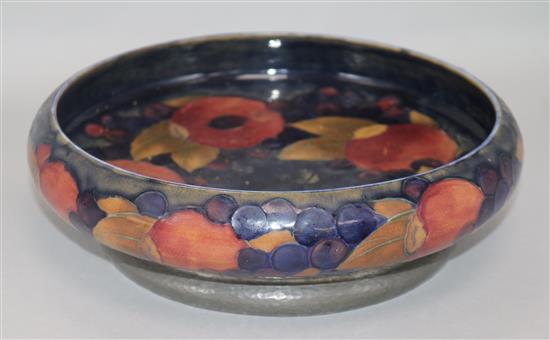 A Moorcroft pomegranate and tudric bowl 23cm.